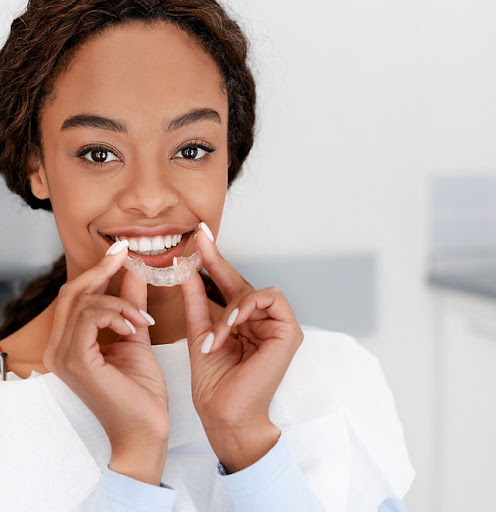 Invisalign transparent orthodontic aligners showcased at Clifton Advanced Dentistry